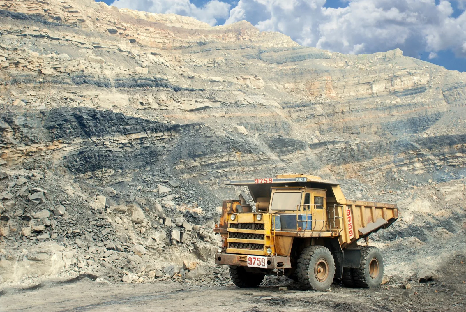 Large mining truck in a rocky quarry